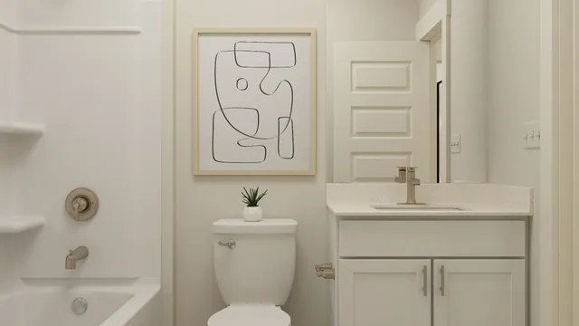 a bathroom with a sink a toilet and a bathtub