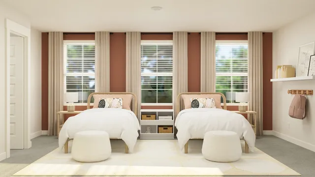a bedroom with two beds and large window