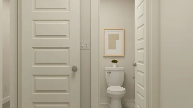 a bathroom with a toilet and a sink