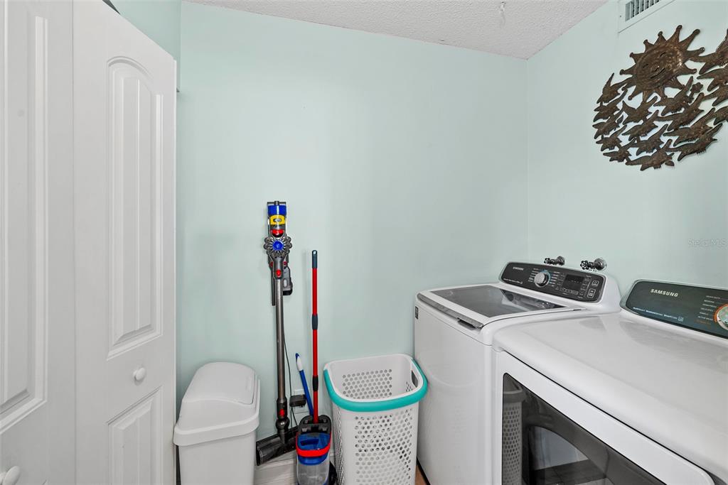 13650 Gulf Boulevard, Unit 604 Madeira Beach, FL 33708 - Photo 28 of 71 a room with storage and utility