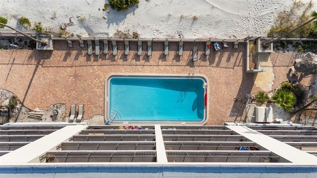 13650 Gulf Boulevard, Unit 604 Madeira Beach, FL 33708 - Photo 64 of 71 a front view of a house with a yard