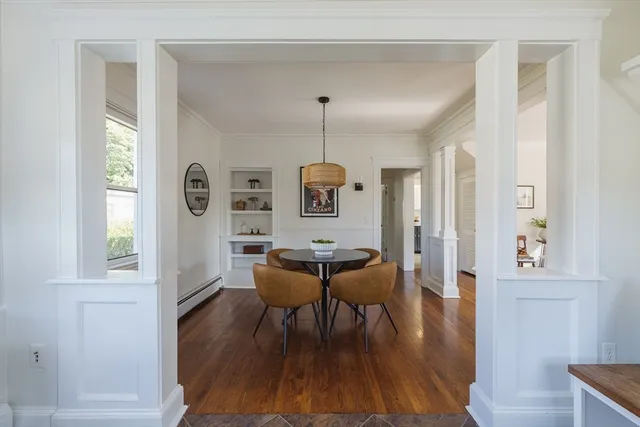 a view of a room with furniture window and wooden floor