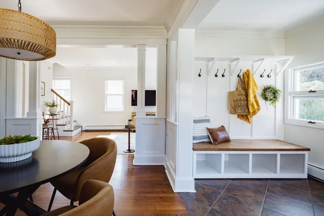 a living room with furniture and a table