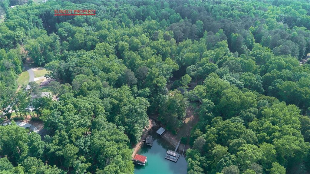 0 Indian Knoll Road Cumming, GA 30041 - Photo 11 of 17 an aerial view of a house with a yard and outdoor seating