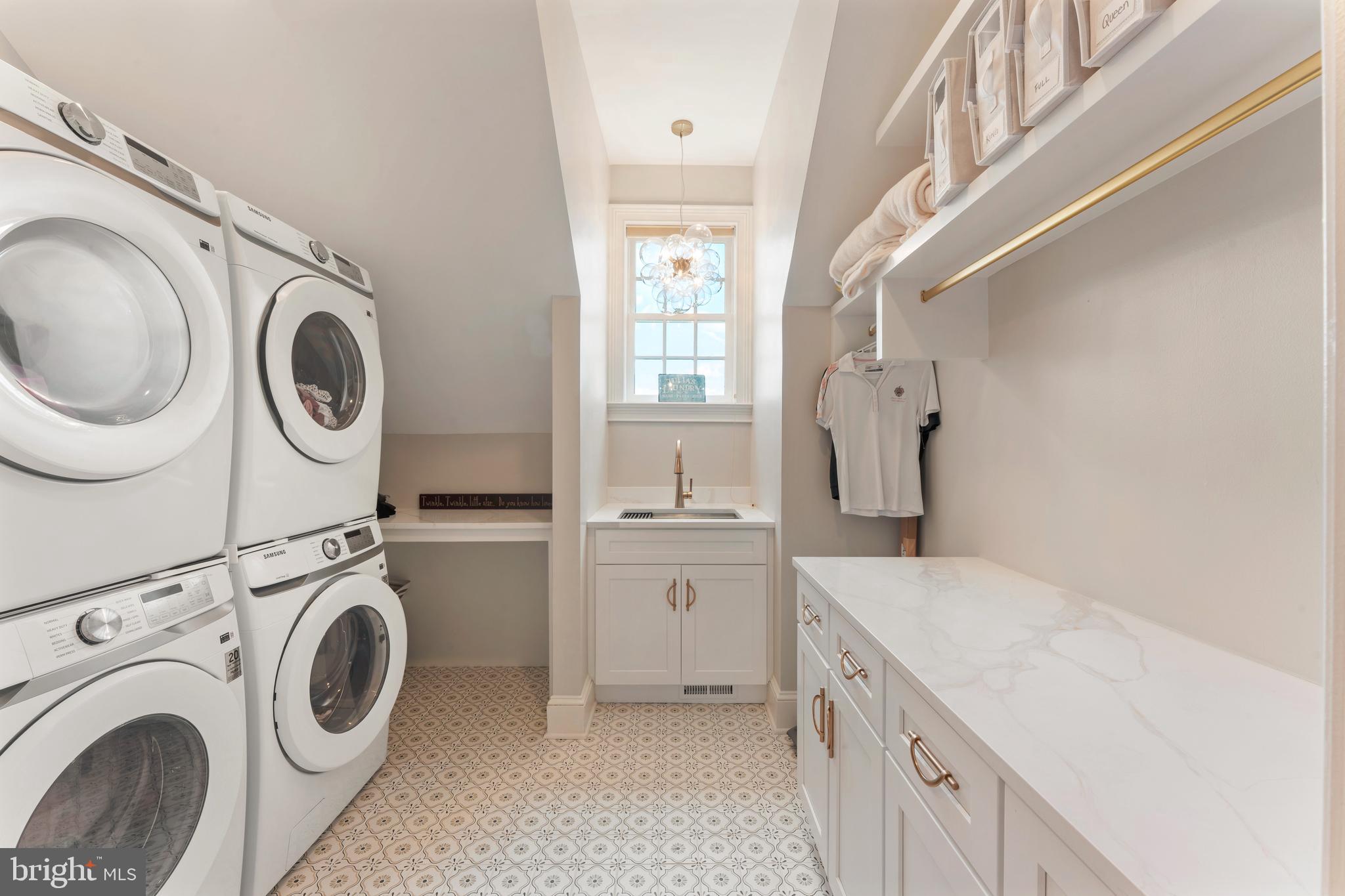 910 Old Dolington Road Newtown, PA 18940 - Photo 32 of 84 a utility room with sink dryer and washer