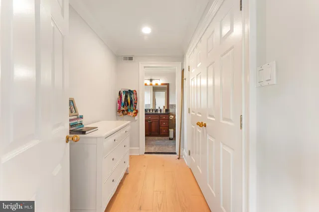 a front view of a house with a yard table and chairs