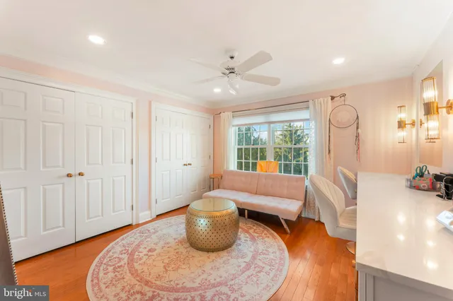 a view of a swimming pool with a yard