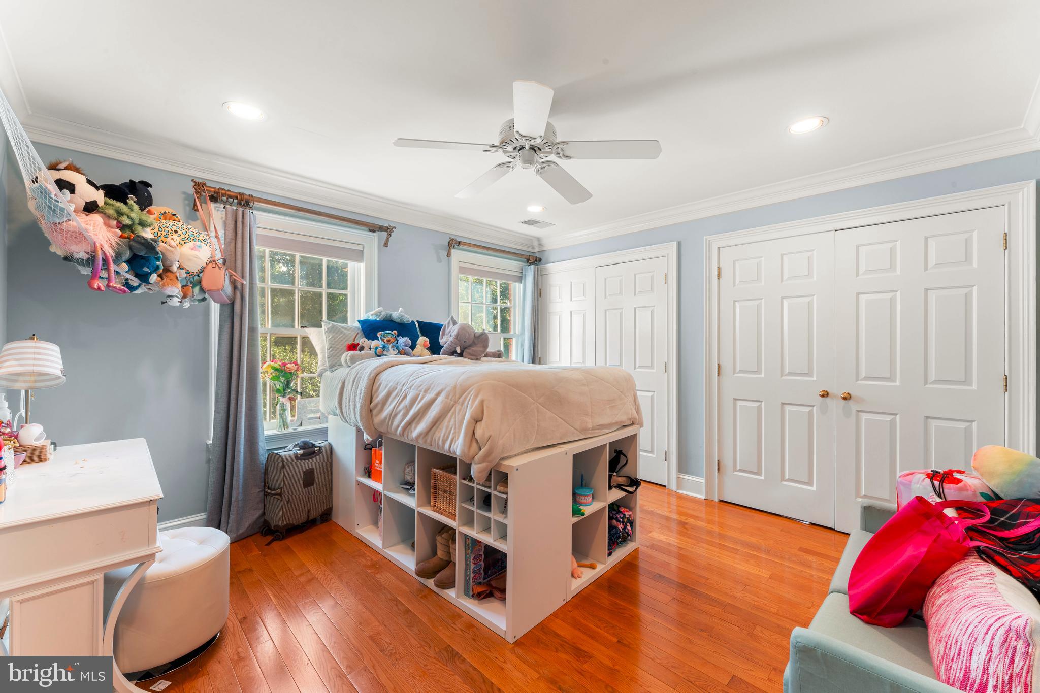 910 Old Dolington Road Newtown, PA 18940 - Photo 40 of 84 a bedroom with a bed and a chandelier