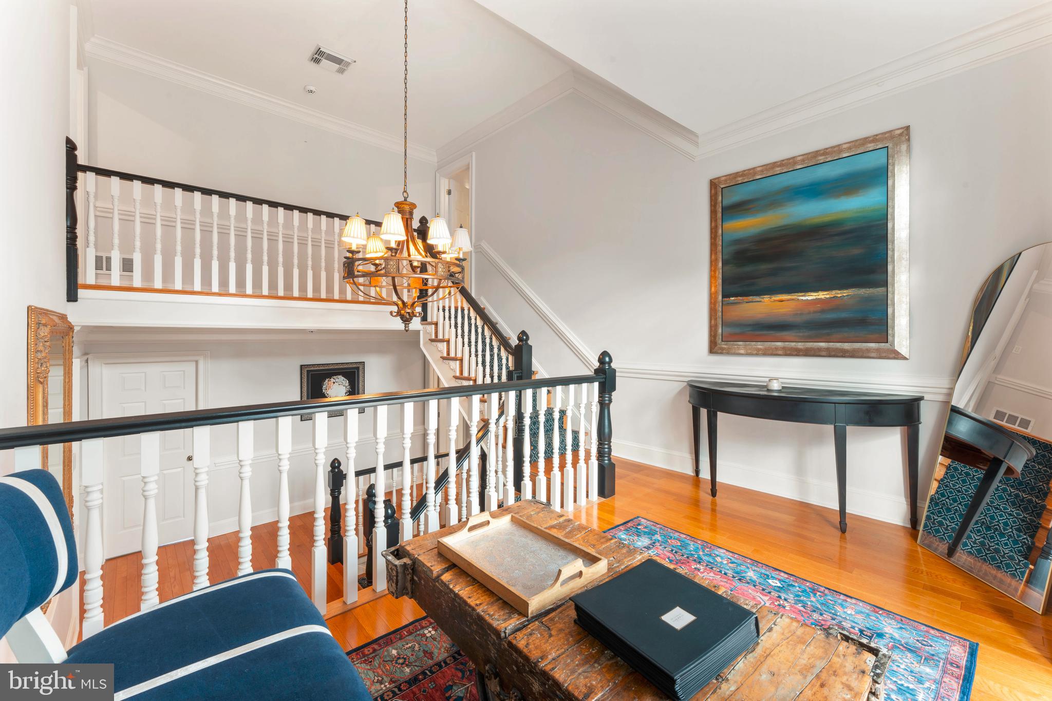 910 Old Dolington Road Newtown, PA 18940 - Photo 44 of 84 a living room with furniture stairs and a wooden floor
