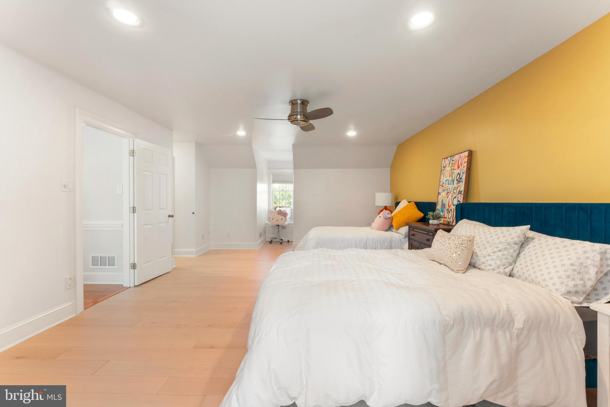 910 Old Dolington Road Newtown, PA 18940 - Photo 46 of 84 a bedroom with a bed and a chandelier
