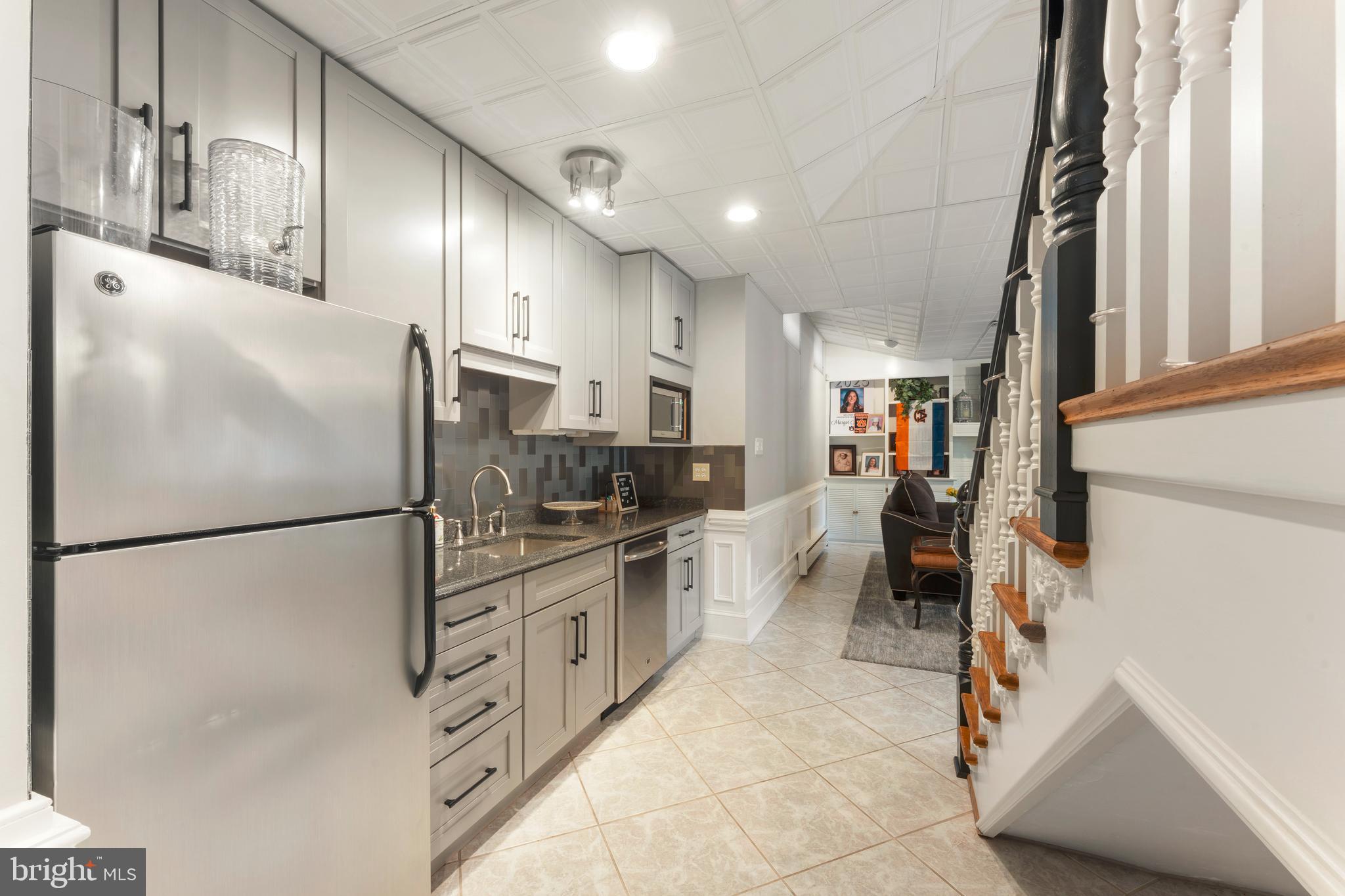910 Old Dolington Road Newtown, PA 18940 - Photo 50 of 84 a kitchen with stainless steel appliances a refrigerator sink and stove