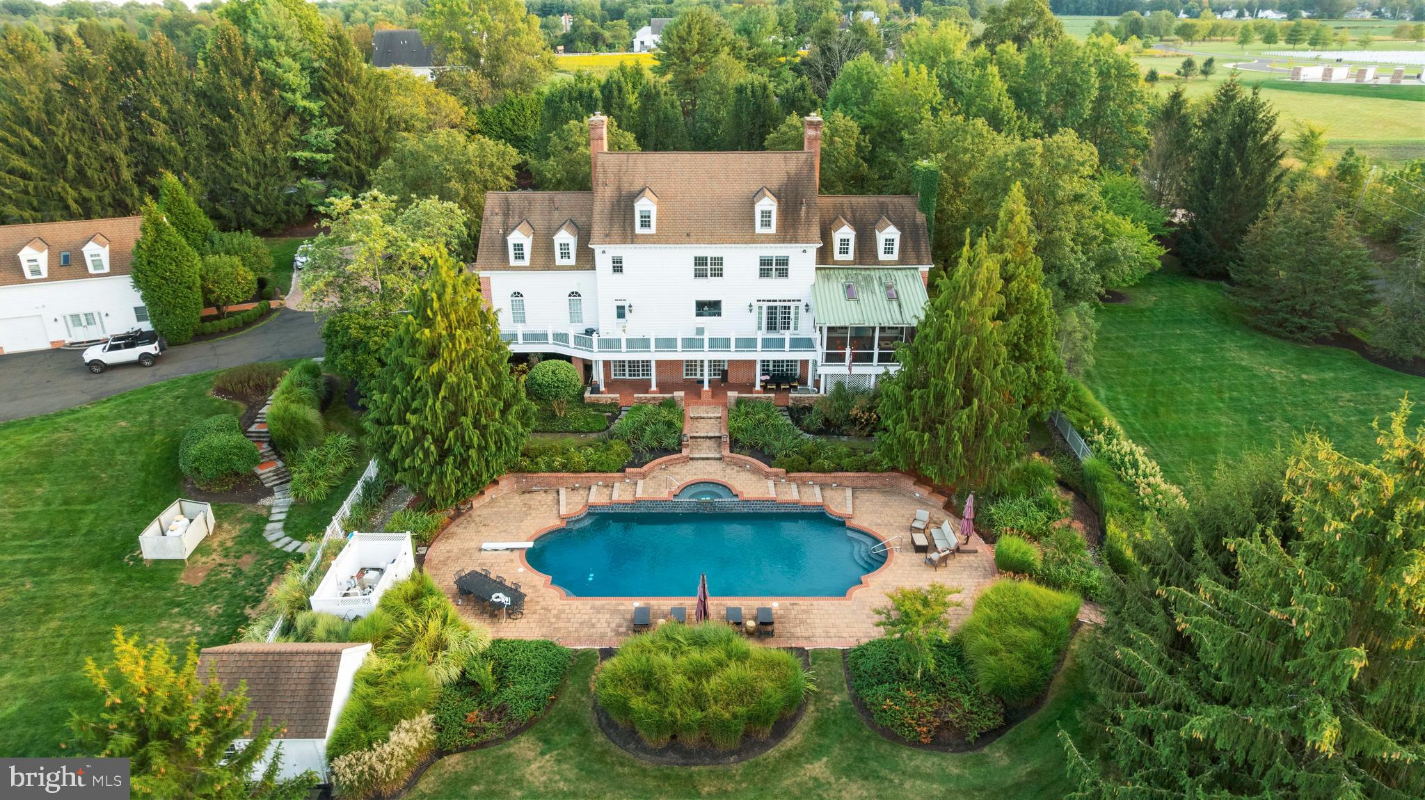 910 Old Dolington Road Newtown, PA 18940 - Photo 57 of 84 a aerial view of a house with yard swimming pool and outdoor seating