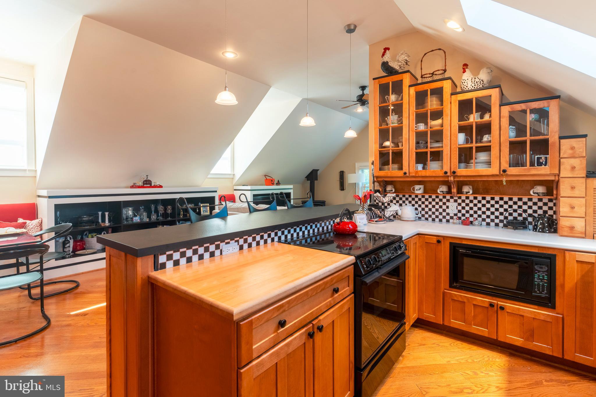 910 Old Dolington Road Newtown, PA 18940 - Photo 77 of 84 a kitchen with stainless steel appliances granite countertop a stove and a microwave