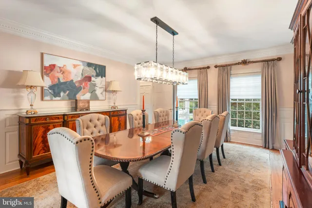 a living room with furniture fireplace and flat screen tv