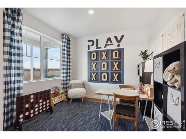 a workspace with furniture and window