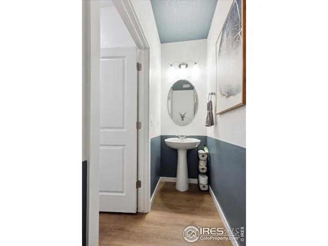 a view of a hallway with washer and dryer