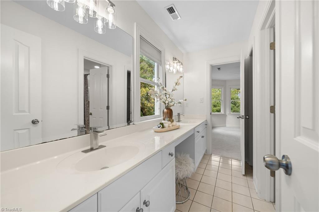 2804 County Clare Road Greensboro, NC 27407 - Photo 33 of 50 Double Vanites connected & shared by bedroom #1 and bedroom #2