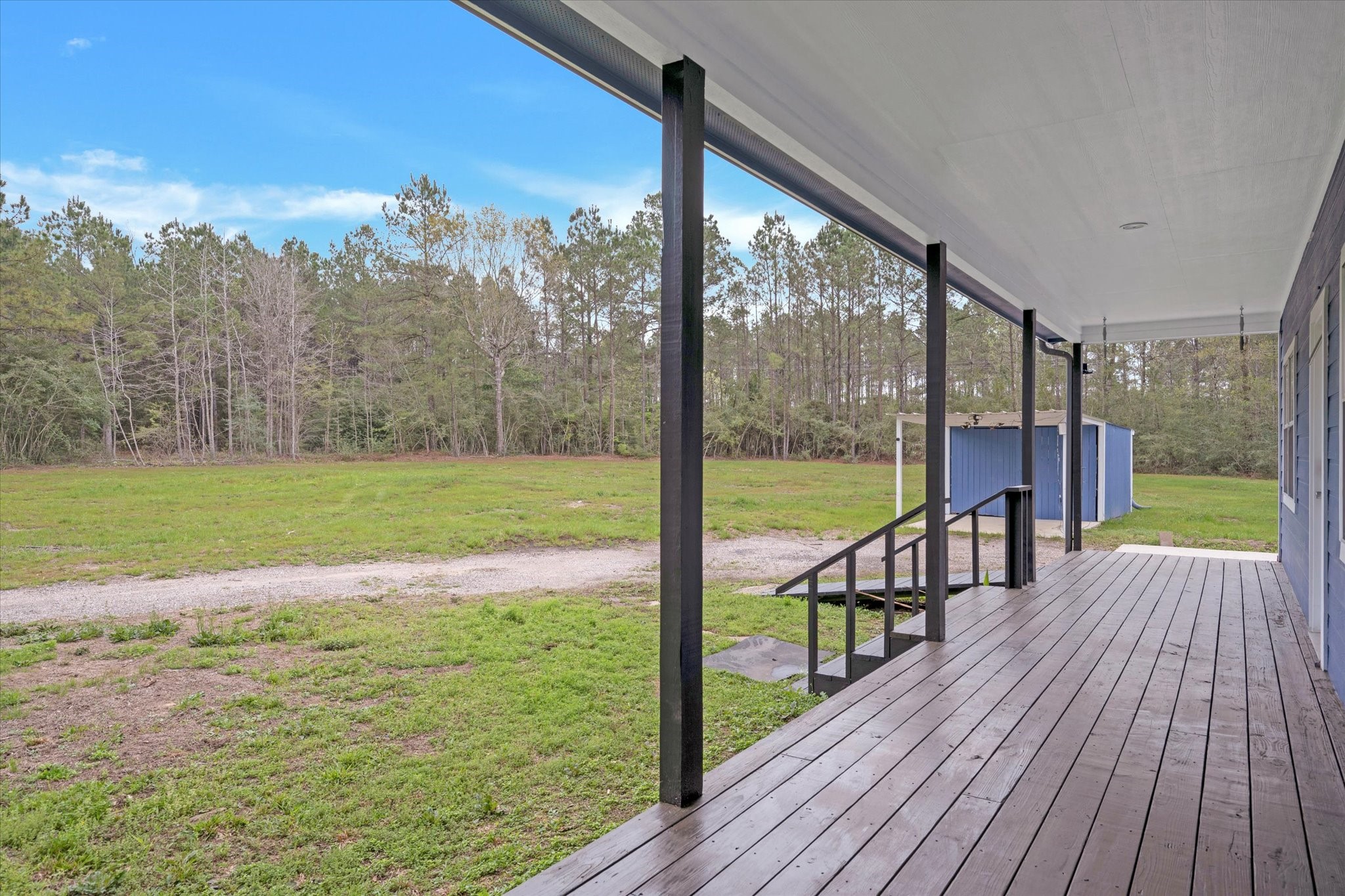 31 Rose Hill Road Coldspring, TX 77331 - Photo 5 of 34 Newly refinished front porch