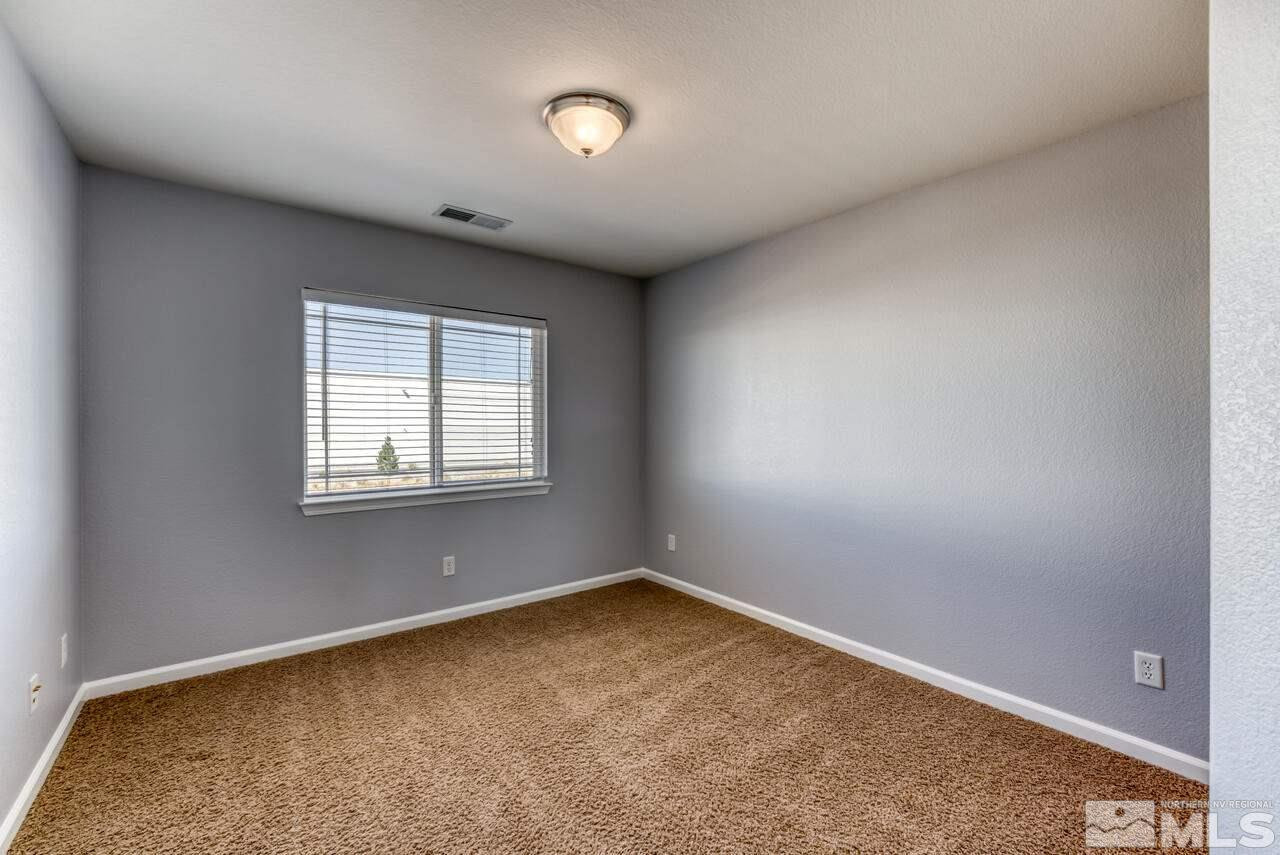 8935 Convair Way Reno, NV 89506 - Photo 23 of 39 an empty room with a window