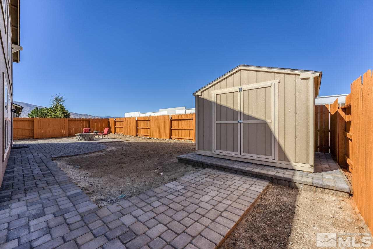 8935 Convair Way Reno, NV 89506 - Photo 36 of 39 a view of a house with backyard
