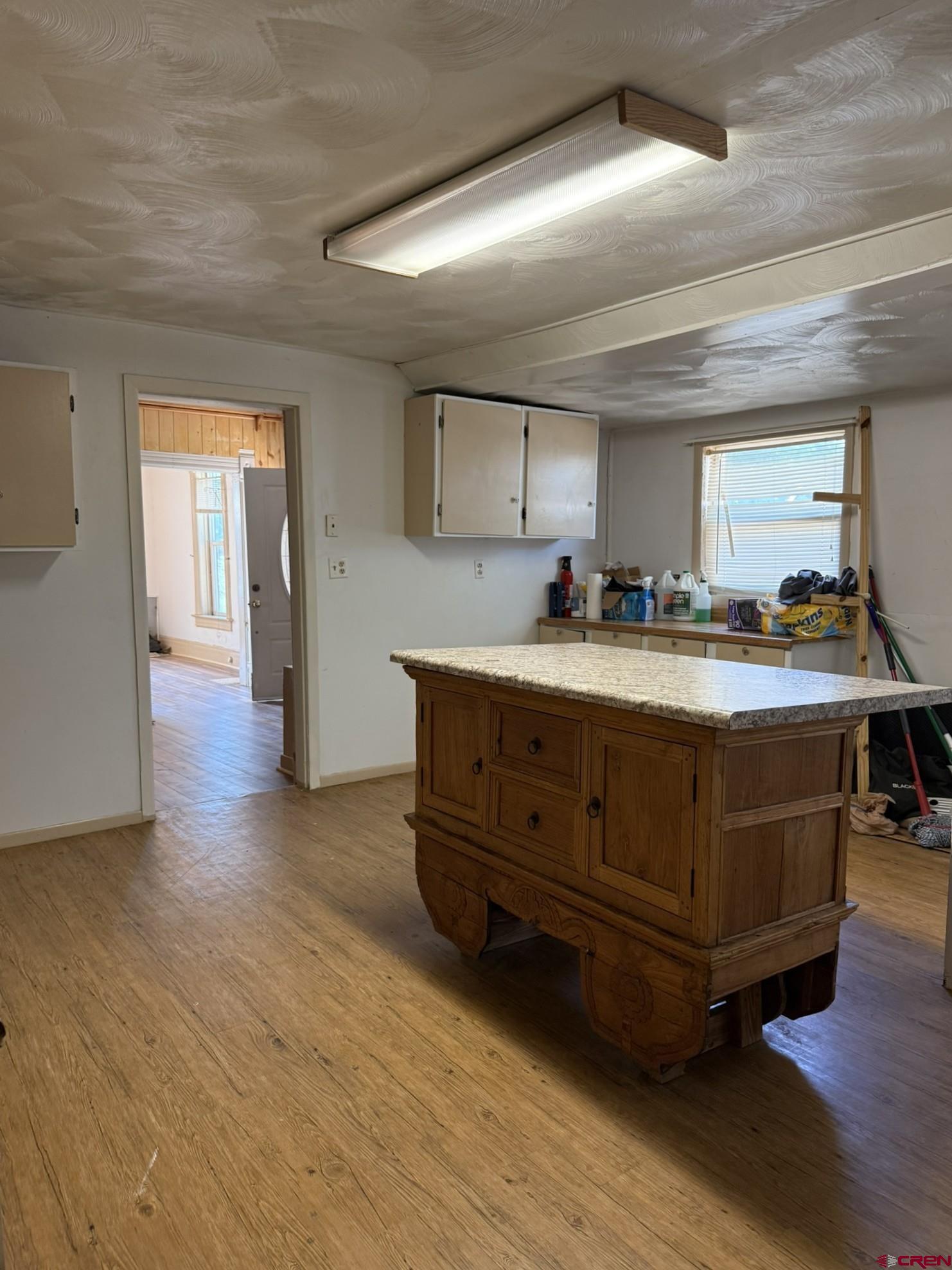 311 West 3rd Street Delta, CO 81416 - Photo 11 of 24 a bathroom with a granite countertop sink and a mirror