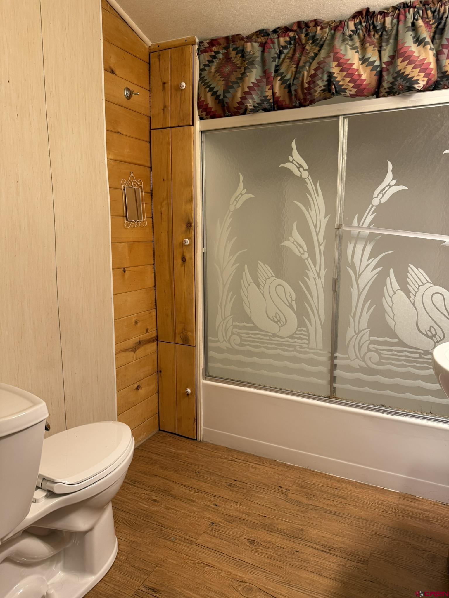 311 West 3rd Street Delta, CO 81416 - Photo 15 of 24 a bathroom with a toilet and shower