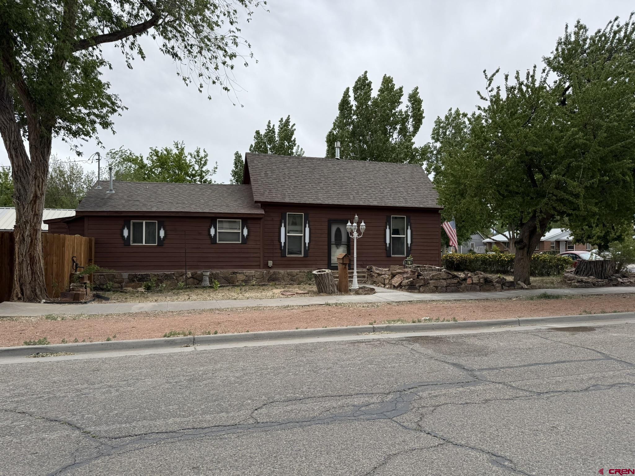 311 West 3rd Street Delta, CO 81416 - Photo 23 of 24 front view of a house with a pathway
