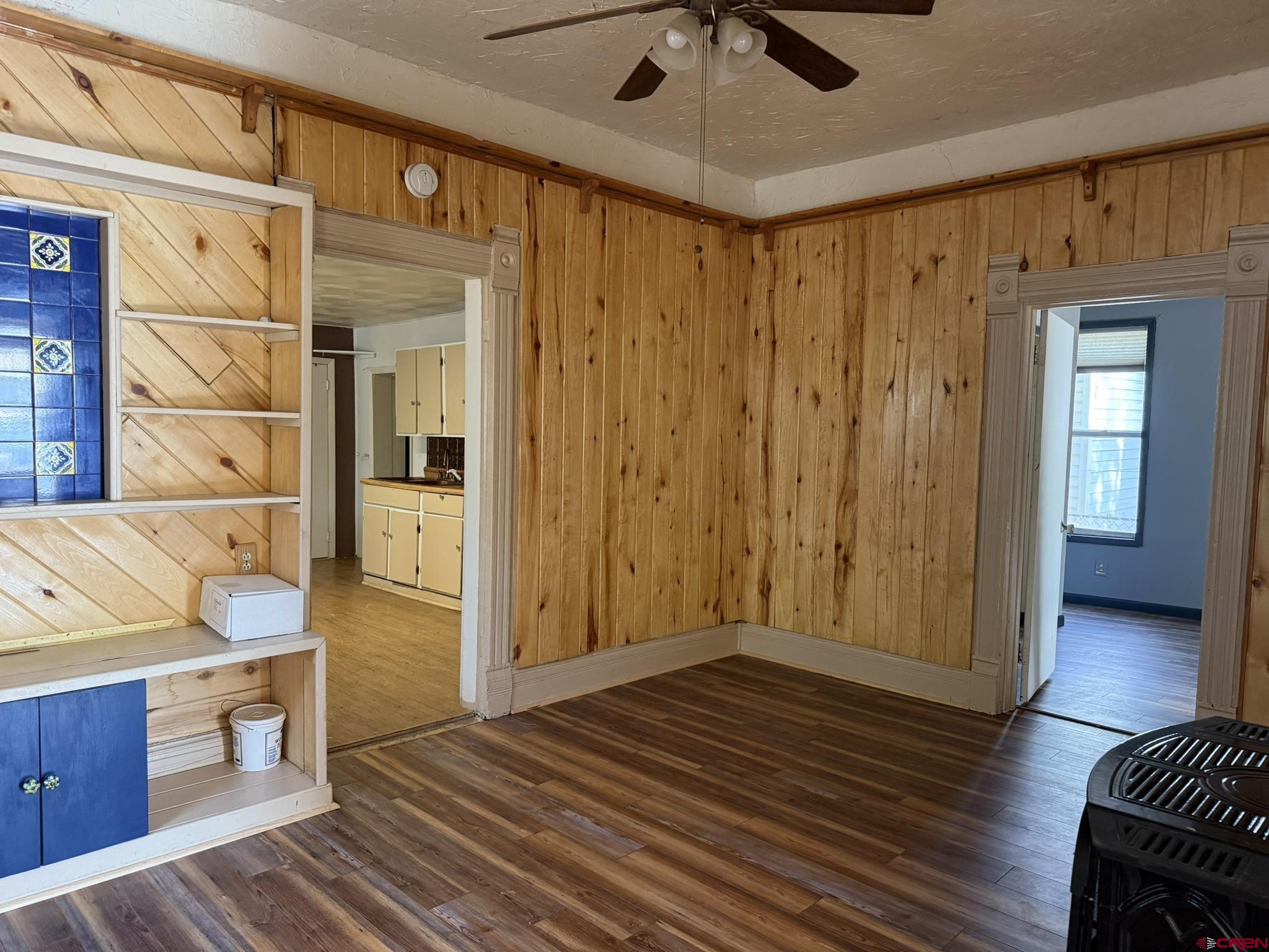 311 West 3rd Street Delta, CO 81416 - Photo 3 of 24 a view of a hallway with wooden floor and cabinet