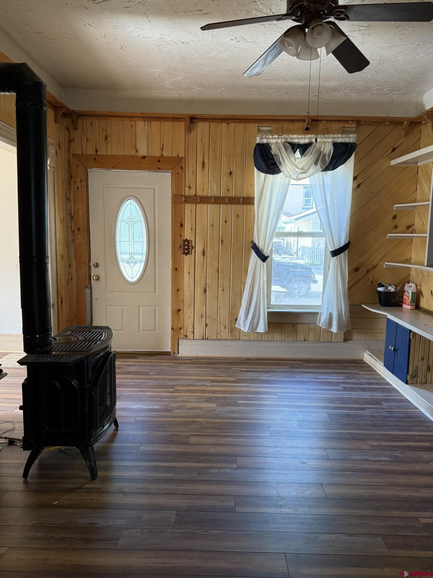 311 West 3rd Street Delta, CO 81416 - Photo 4 of 24 a view of a livingroom with wooden floor