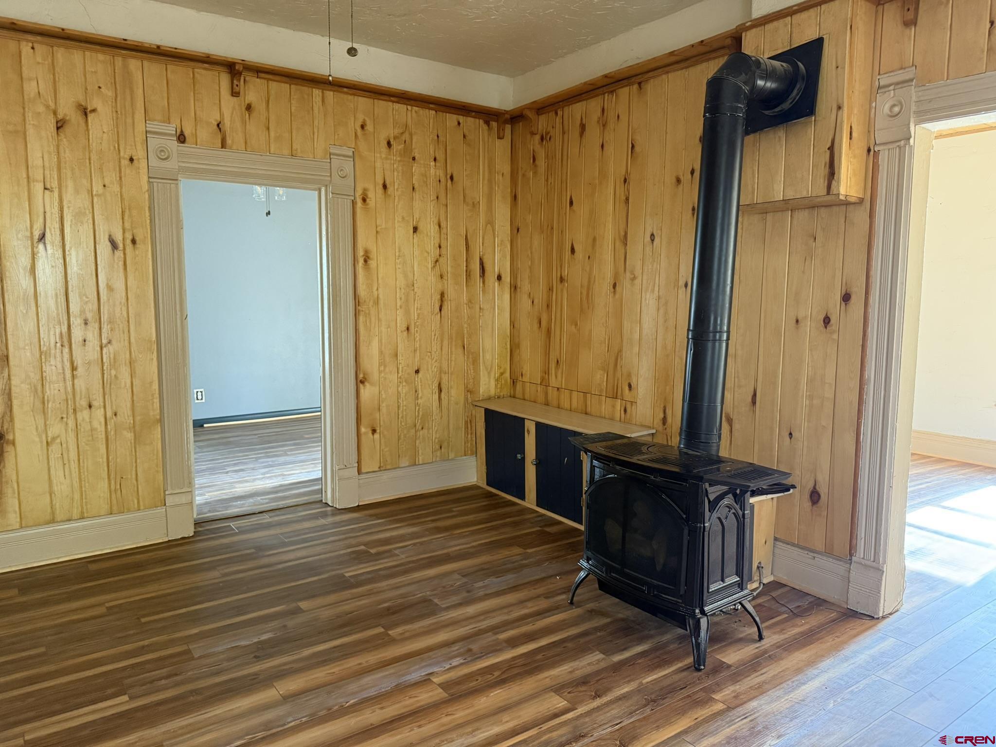 311 West 3rd Street Delta, CO 81416 - Photo 5 of 24 a view of a hallway with wooden floor
