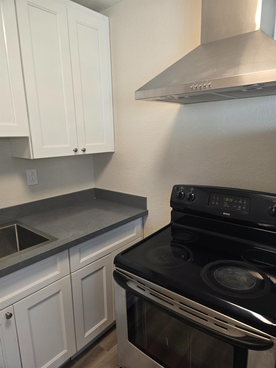 1036 North Sutter Street, Unit 4 Stockton, CA 95202 - Photo 4 of 5 a close view of stove top oven