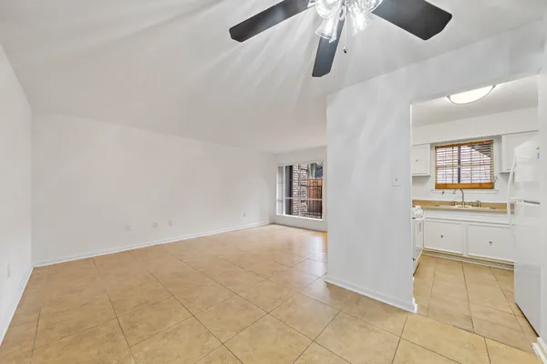 a view of a kitchen with a sink