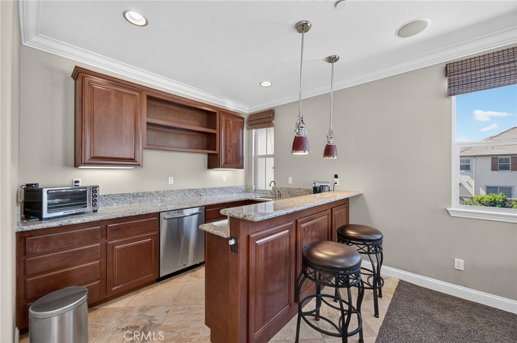 31749 Country View Road Temecula, CA 92591 - Photo 25 of 68 a kitchen with a sink stove and cabinets