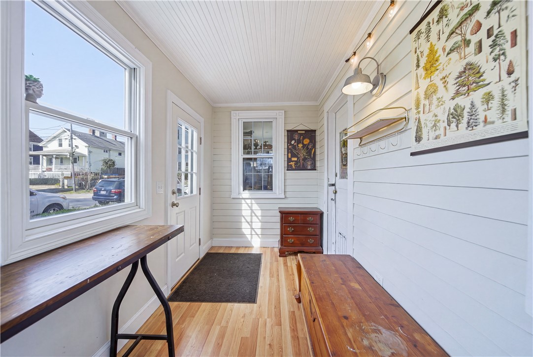 27 Barney Street Warren, RI 02885 - Photo 16 of 39 First floor enclosed porch