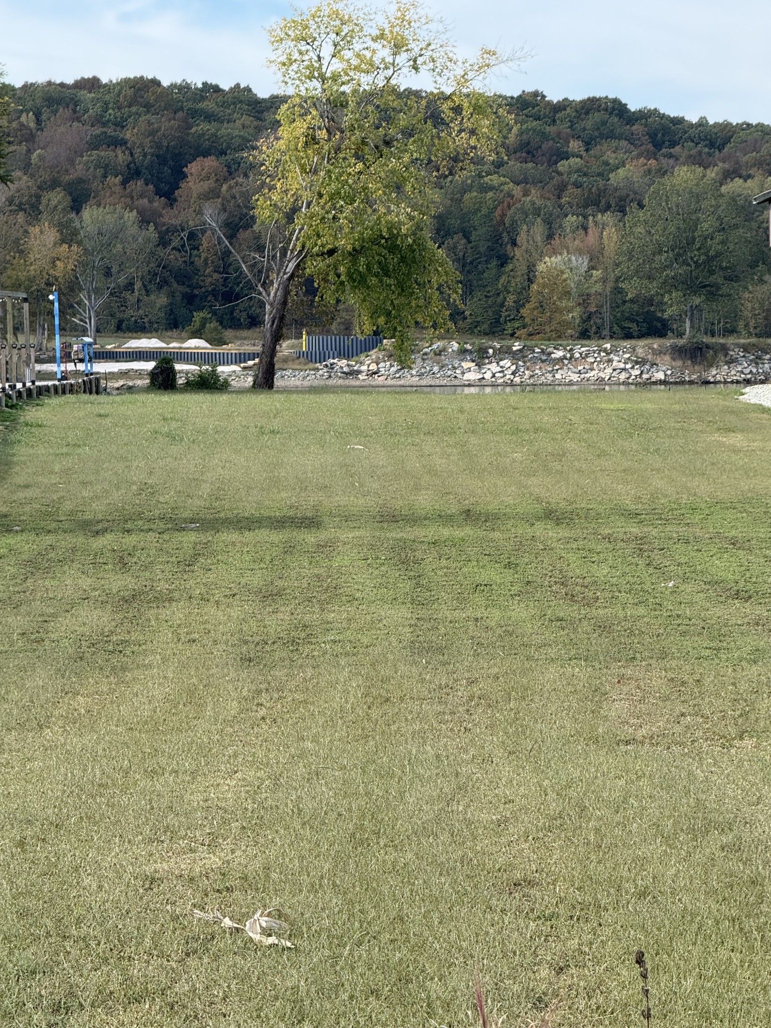 313 Hardin Bottom River Road Clifton, TN 38425 - Photo 20 of 21 a view of a lake with mountains in the background