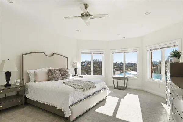 a kitchen with a table and chairs in it