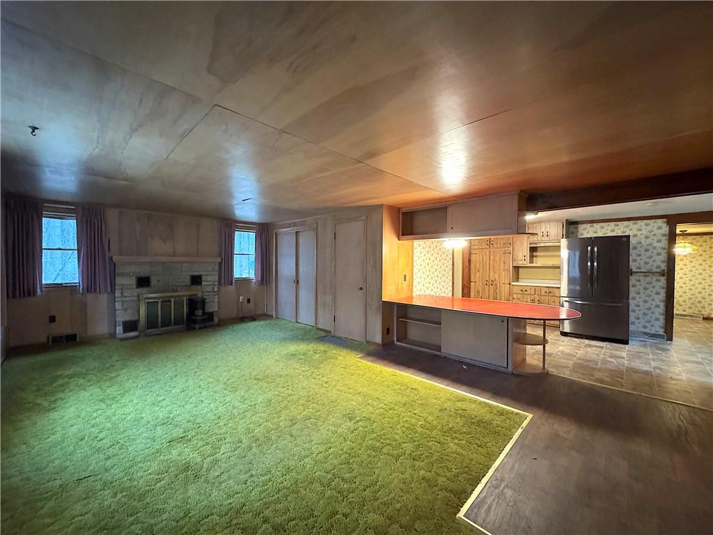 671 Solomon Temple Road Latrobe, PA 15650 - Photo 11 of 32 a view of a room with gym equipment