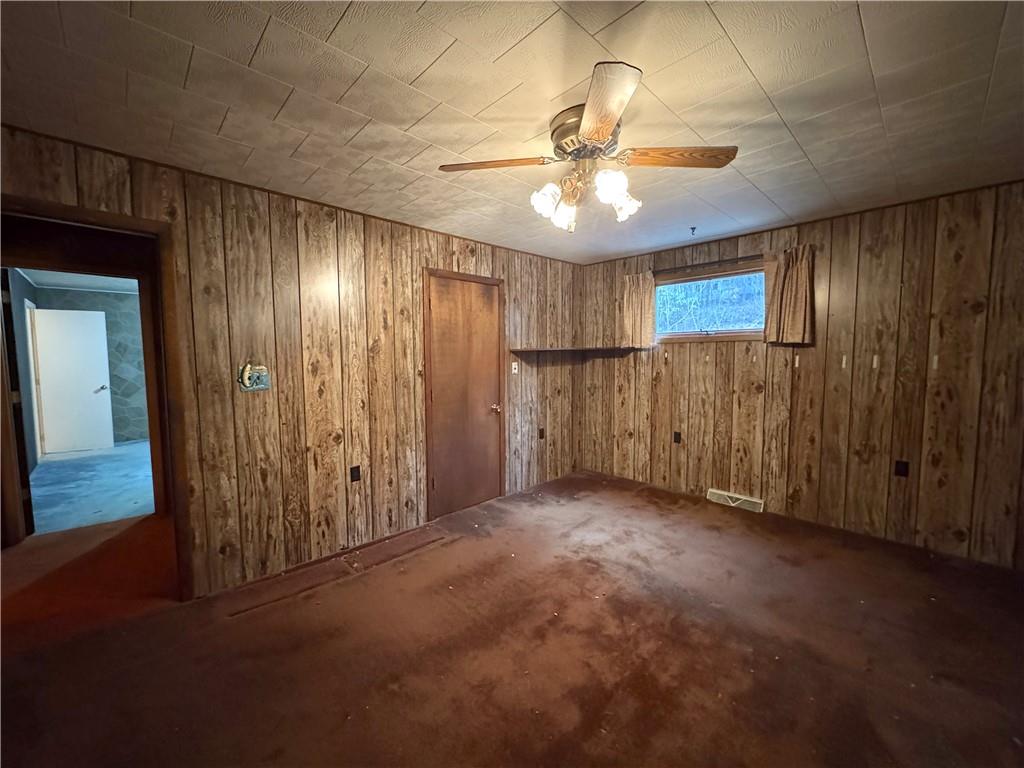 671 Solomon Temple Road Latrobe, PA 15650 - Photo 23 of 32 a view of an empty room with a chandelier fan