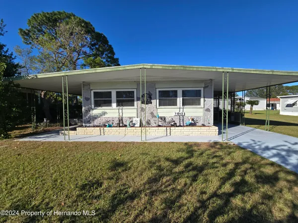 a view of a house with patio