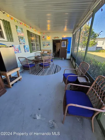 a view of yard with patio