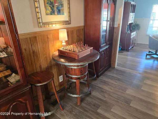 a room with furniture and a wooden floor