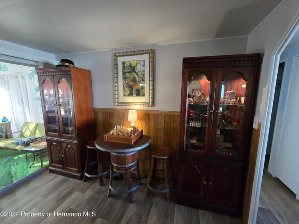 a view of residential houses with outdoor space and lakeside