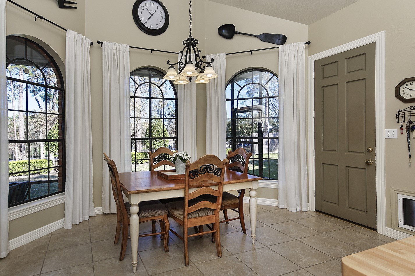 24635 West Kingscrest Circle Spring, TX 77389 - Photo 14 of 38 a view of a dining room with furniture window and outside view