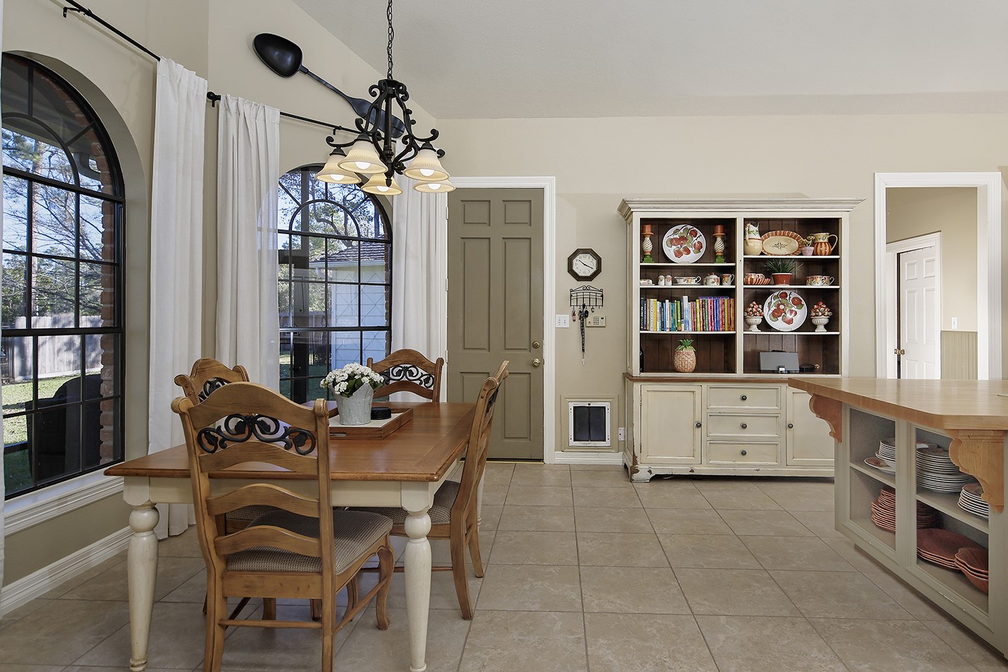24635 West Kingscrest Circle Spring, TX 77389 - Photo 15 of 38 a dining room with furniture and window