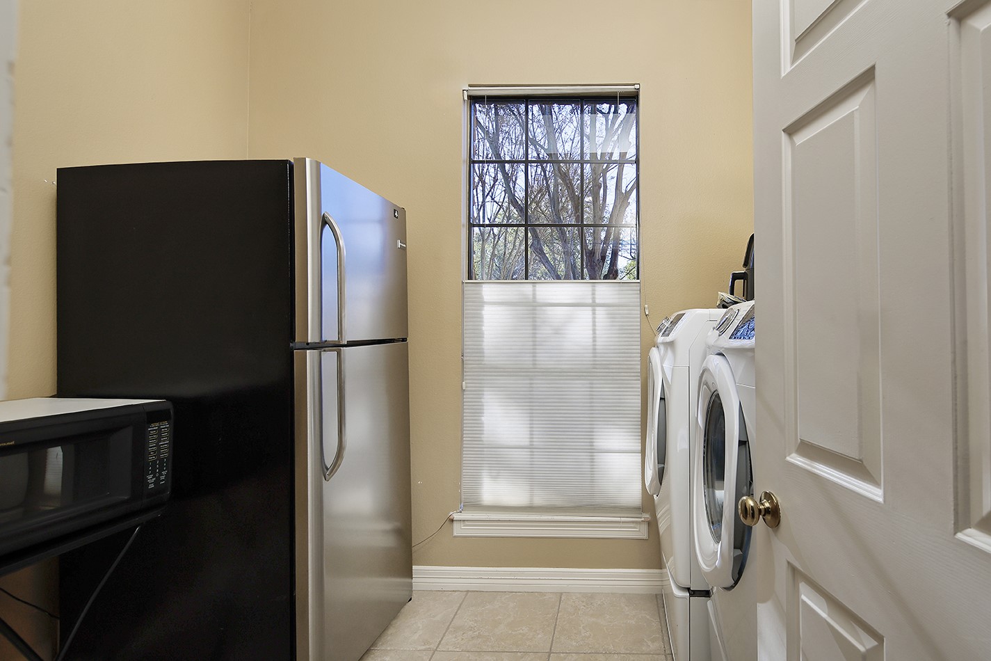 24635 West Kingscrest Circle Spring, TX 77389 - Photo 18 of 38 a bathroom with a glass shower door