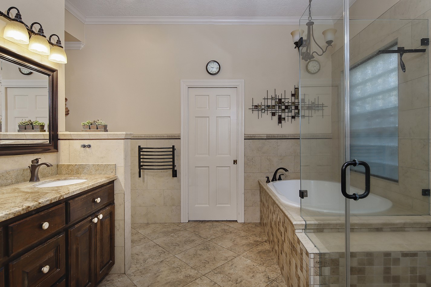 24635 West Kingscrest Circle Spring, TX 77389 - Photo 23 of 38 a bathroom with a sink and mirror