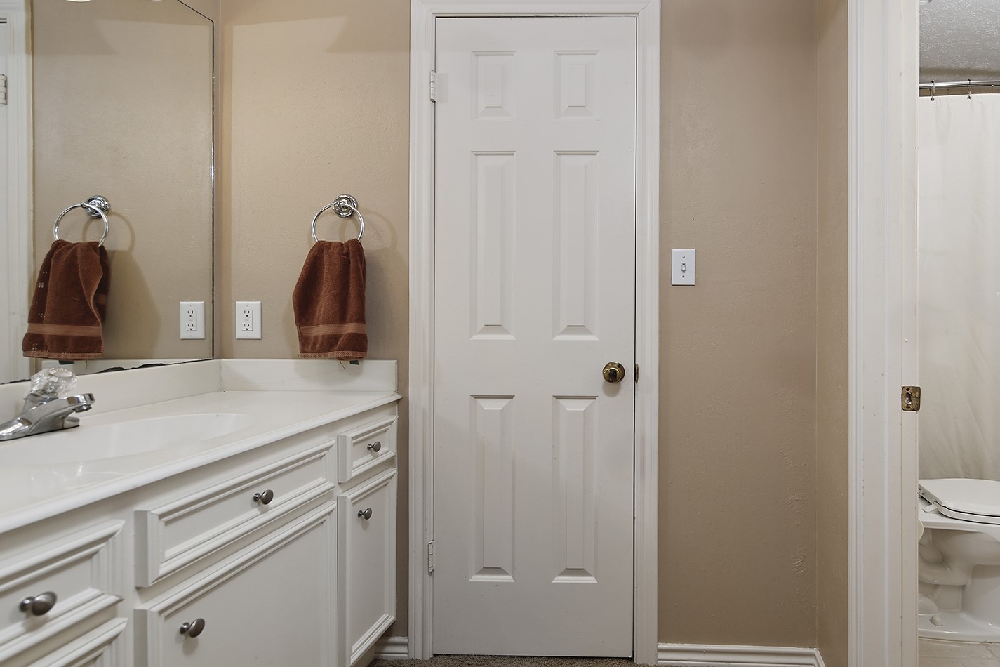 24635 West Kingscrest Circle Spring, TX 77389 - Photo 28 of 38 a bathroom with a granite countertop sink and a mirror