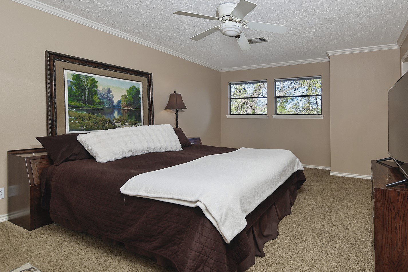 24635 West Kingscrest Circle Spring, TX 77389 - Photo 29 of 38 a bedroom with a bed and a window