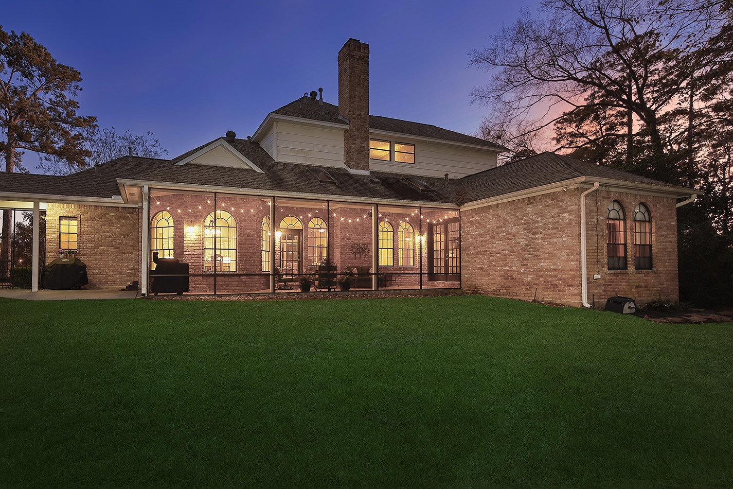 24635 West Kingscrest Circle Spring, TX 77389 - Photo 30 of 38 a front view of a house with a garden