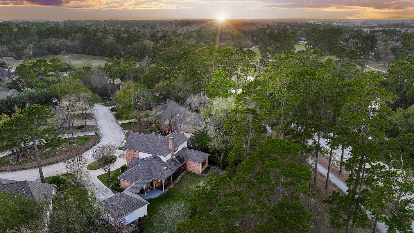 24635 West Kingscrest Circle Spring, TX 77389 - Photo 38 of 38 an aerial view of residential houses with outdoor space and trees